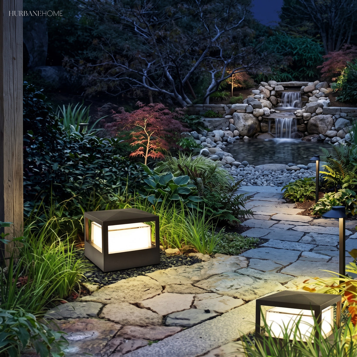 Aluminium post cap outdoor landscape light in a garden setting