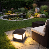Aluminium post cap outdoor landscape light in a garden setting