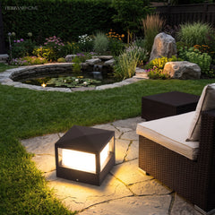 Aluminium post cap outdoor landscape light in a garden setting