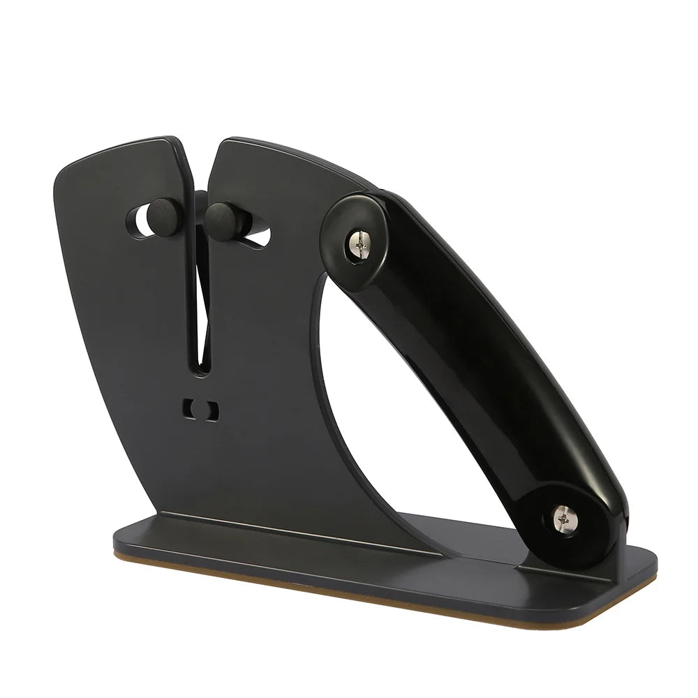 Black knife sharpener with non-slip base on countertop
