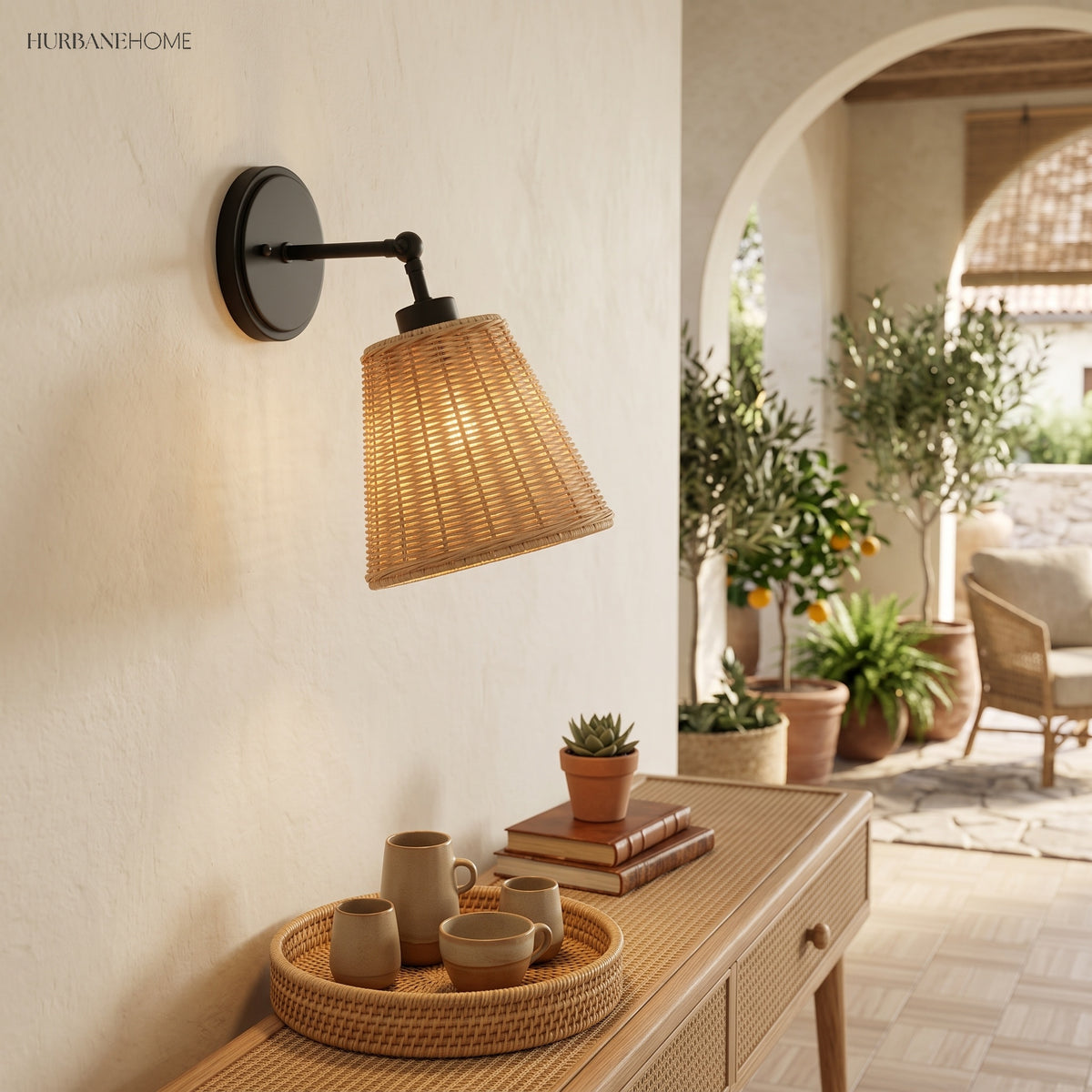 Black arm rattan sconce on a wall beside an arched garden doorway