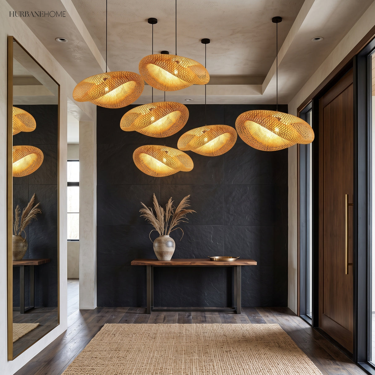 Row of woven bamboo pendant lights along a dark panelled entry hall
