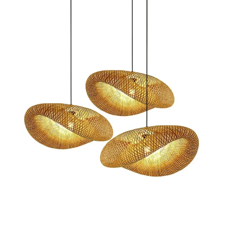 Cluster of rattan saucer pendants hanging in a double height room