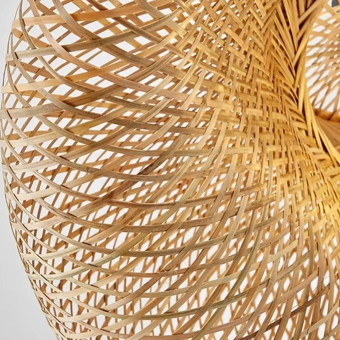 Stacked woven bamboo shades showing the layered weave pattern