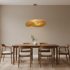 Three bamboo saucer shades at different heights on black cords