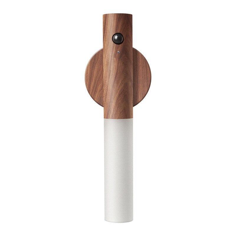 Dark walnut version of the cordless lamp standing on a plain background