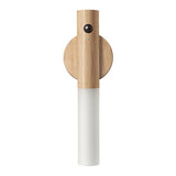 Light oak version of the cordless lamp standing on a plain background