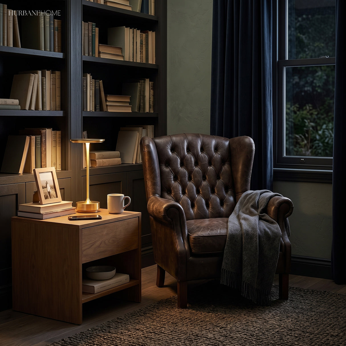 Dish lamp lighting a dark panelled study with armchair behind