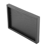 Rectangular wood serving tray styled on dining table