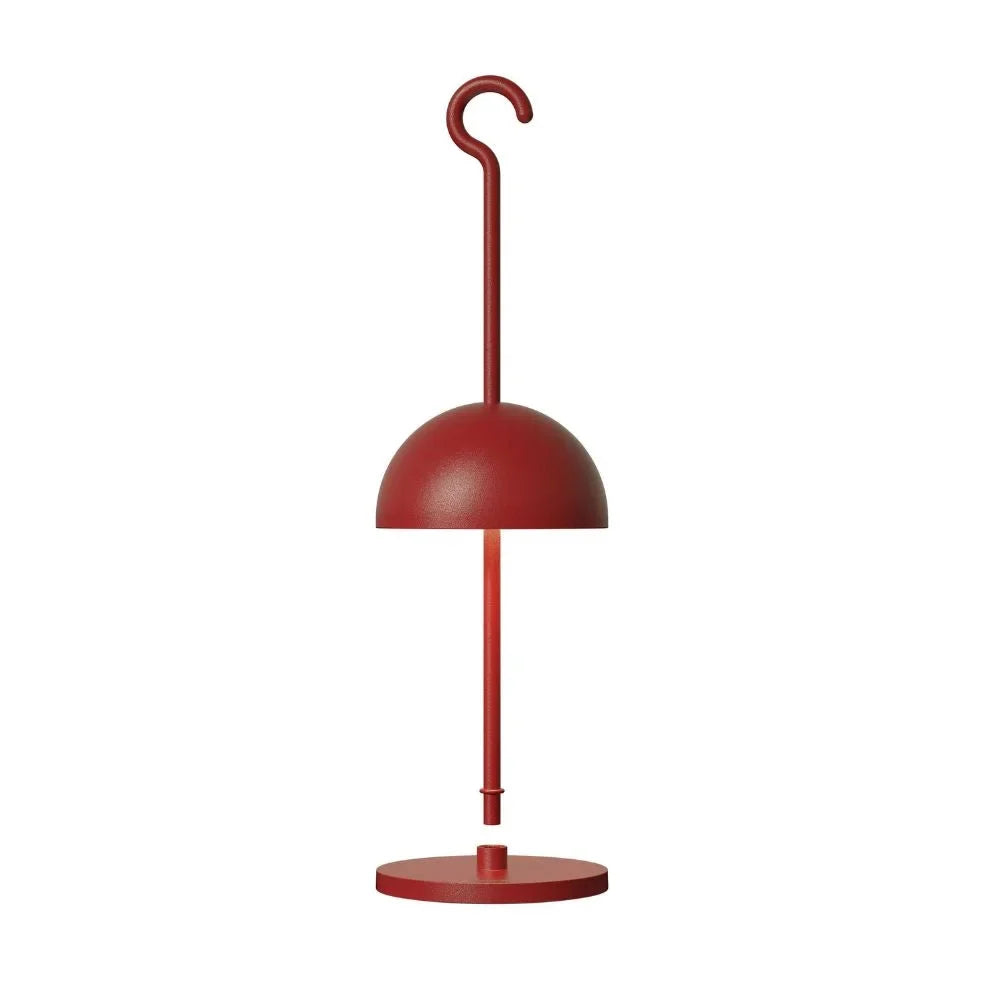 Red portable LED table lamp showing the dome shade, stem and flat round base