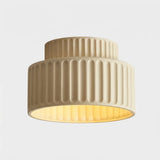 Vintage resin semi flush mount ceiling light shown against a white studio background