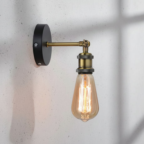 Industrial wall sconce full product lifestyle shot on brick wall