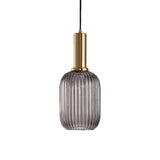 Smoke ribbed capsule pendant with a brass collar on white