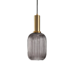 Smoke ribbed capsule pendant with a brass collar on white