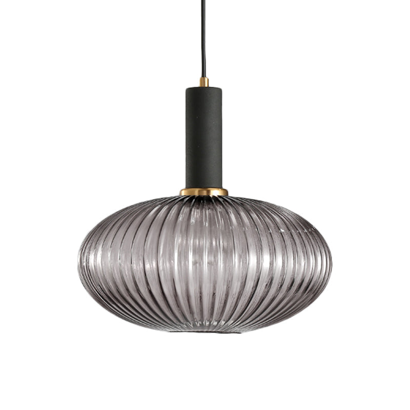 Smoke ribbed oval pendant with a black collar, shown on white
