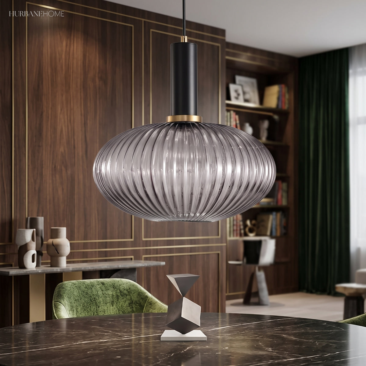 Smoke ribbed oval pendant lit in a room of dark timber cabinets