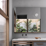 Ribbed round wall light on a bathroom cabinet above a marble vanity