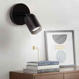 Overhead angle of the rotatable spotlight sconce and its round base