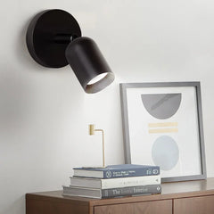 Overhead angle of the rotatable spotlight sconce and its round base