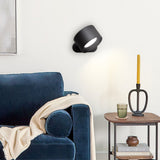 Rotatable wall sconce head tilted to show 360 degree rotation