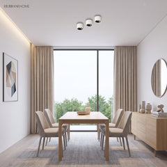 Round adjustable LED spotlight in a styled interior