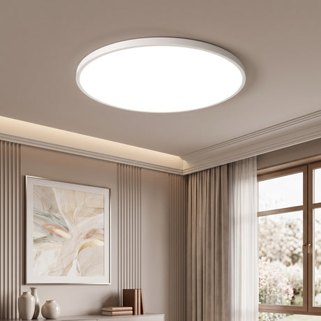 Slim round LED flush mount ceiling light in white