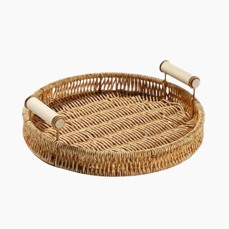 round rattan serving tray with snacks and tea cups