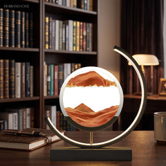 Red sand motion lamp lit on wooden desk before a bookshelf