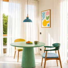 Close view of the metal dome shade and natural wood collar on the pendant light