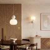 Cream art deco pendant light in a modern dining nook