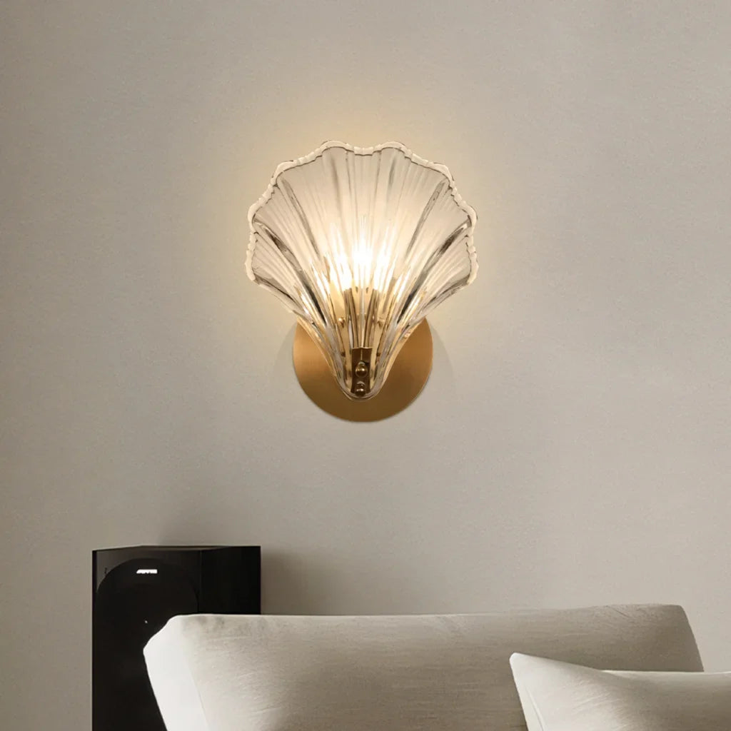 Amber shell glass wall sconce viewed straight on with the light off