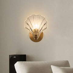 Amber shell glass wall sconce viewed straight on with the light off