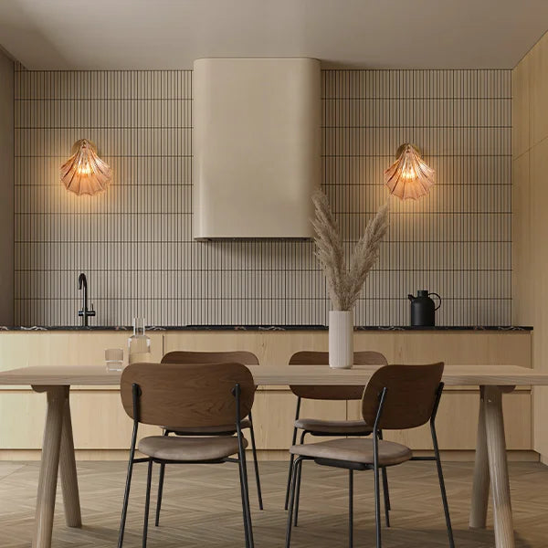 Amber shell glass wall sconce switched off showing its natural tint