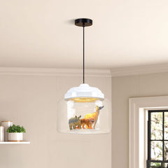 White-capped glass pendant holding tiger, rhino and antelope figures against a panelled wall