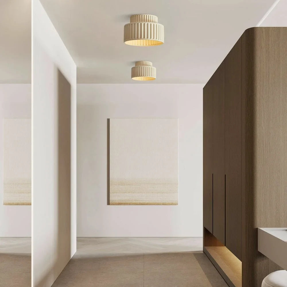Compact fluted ceiling light shown to scale against a neutral studio wall