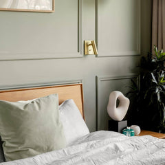 Switched LED wall sconce with a slim cylindrical head, black metal, view 10