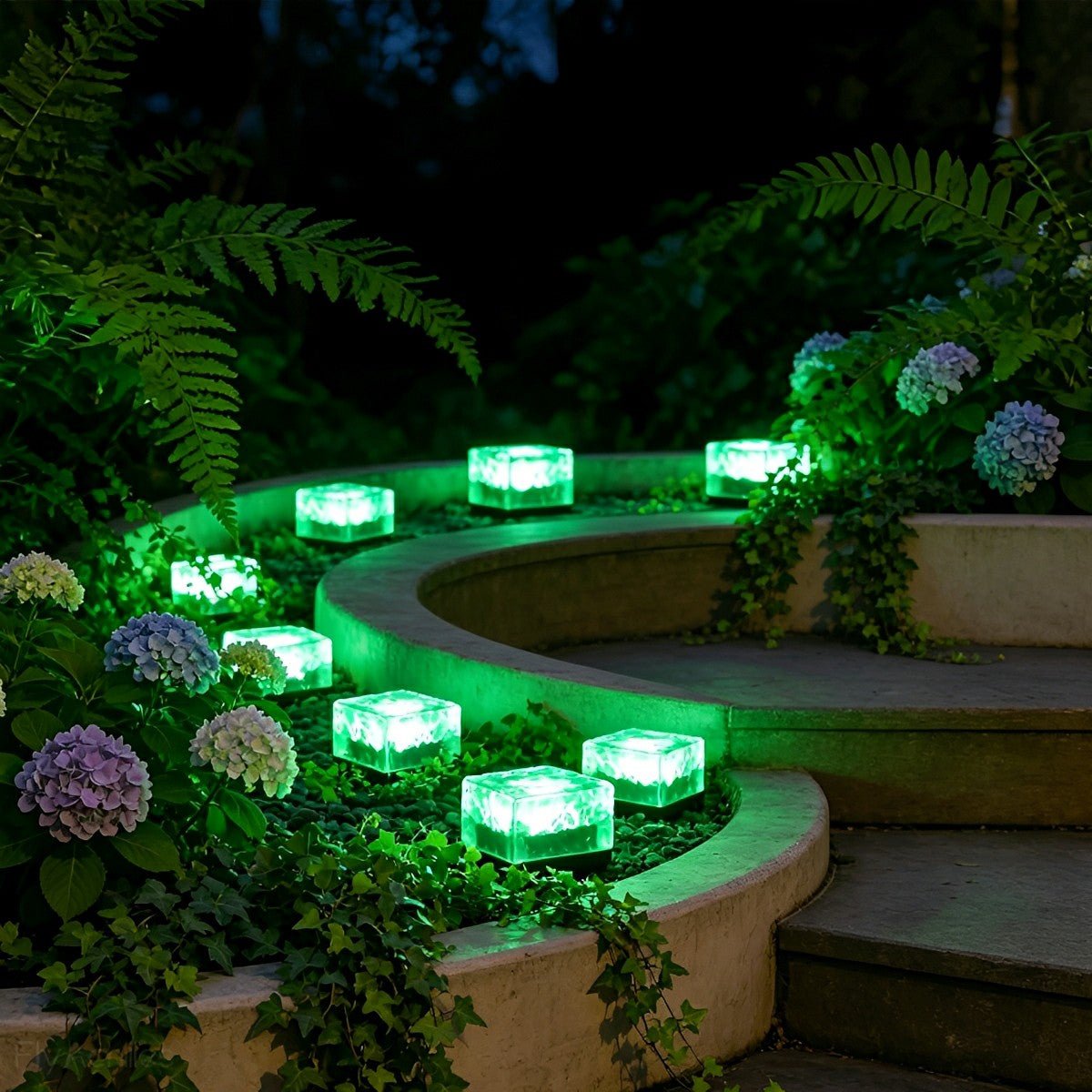 Green cube lights curving along a raised garden bed edge in the dark