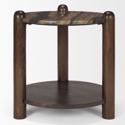 Solid mango bedside table styled next to armchair