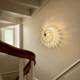 Shell wall light lighting a staircase