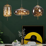 Glass pendant shade with an integrated starry LED cluster
