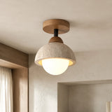 Stone dome ceiling light with wood collar side view