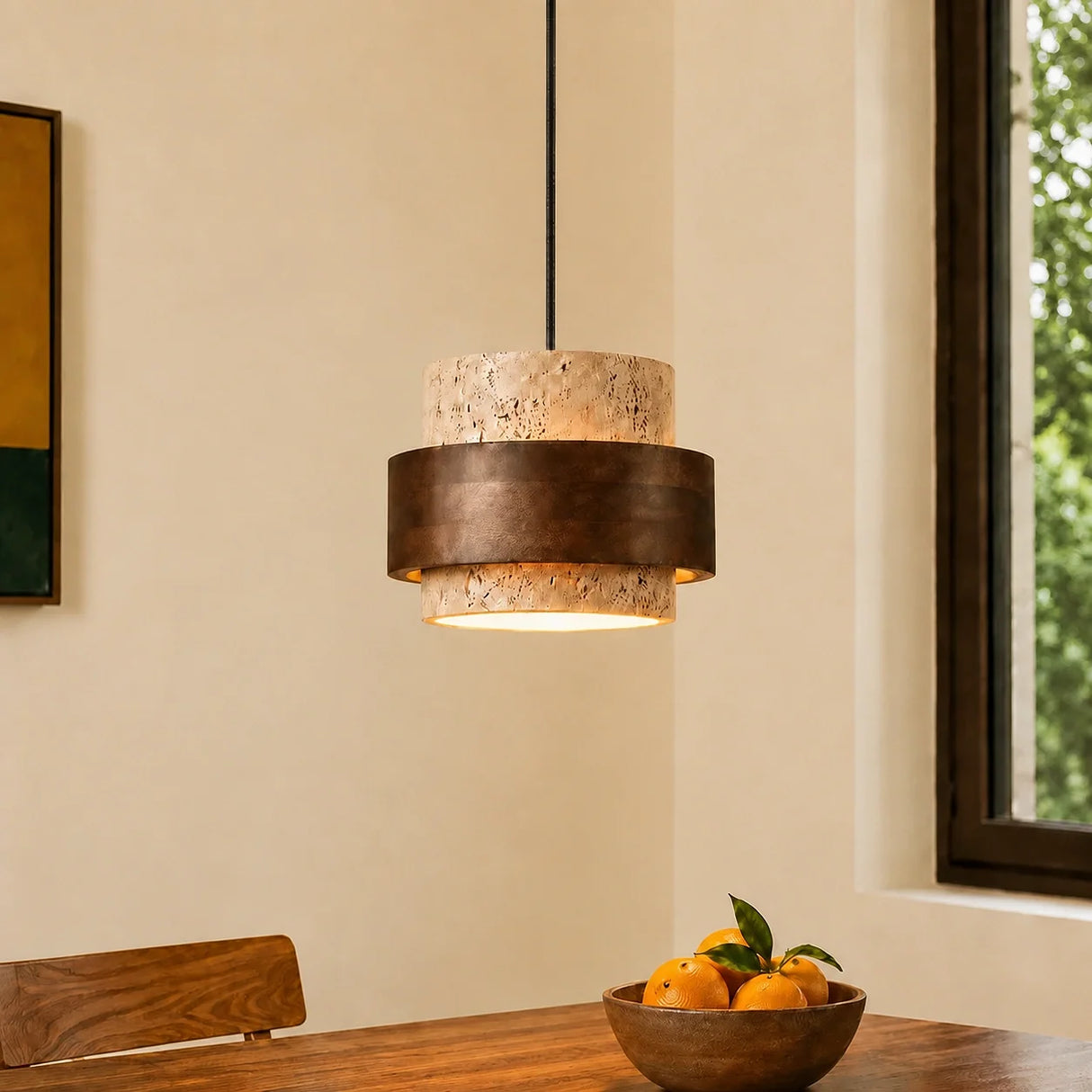 Beige stone pendant light, single head, on a dining room wall