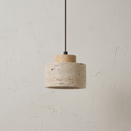 Short wide stone pendant with a light wood cap glowing below