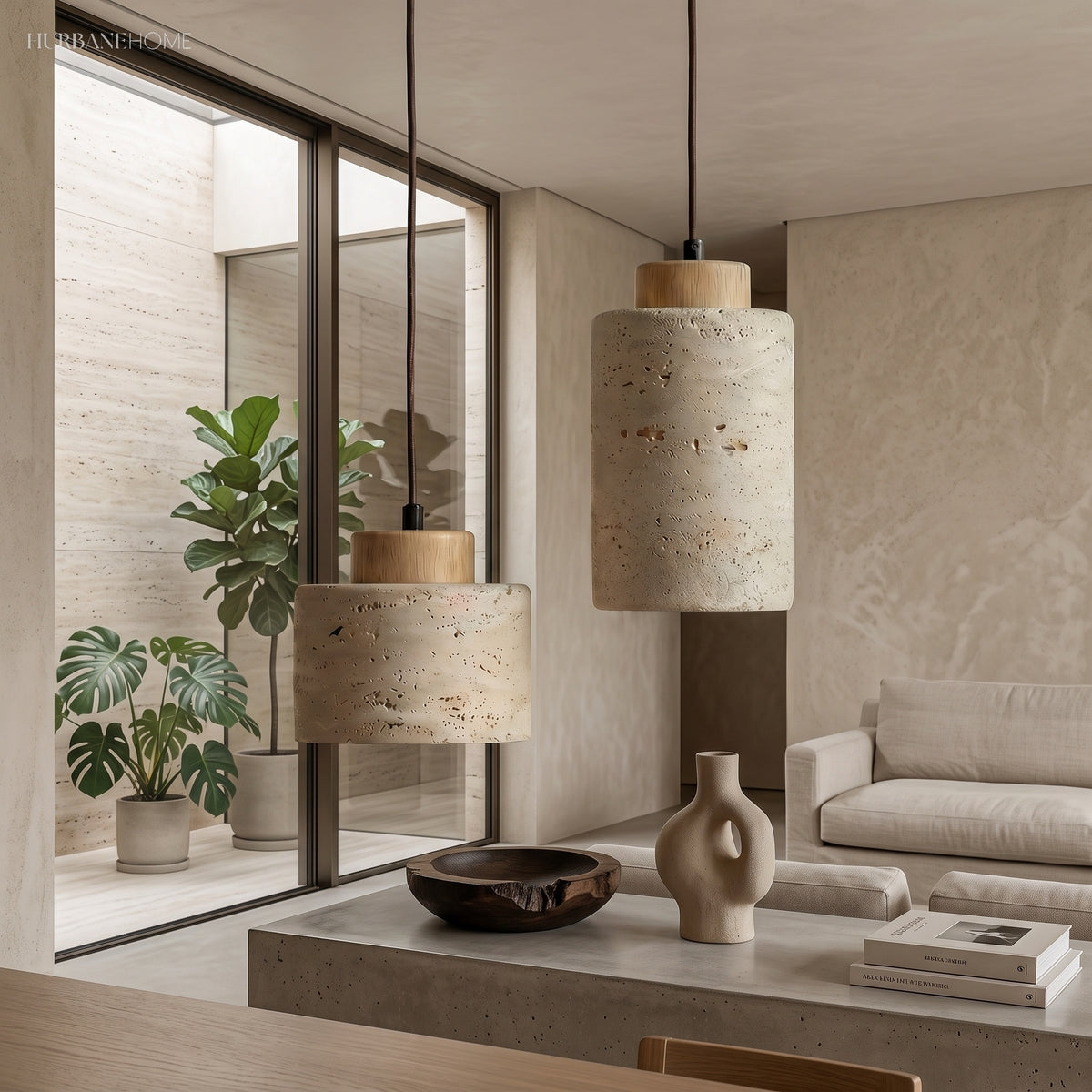 Stone pendants with wood caps lit beside a plant filled window