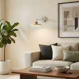 Wood ball accent and shade join detail on the modern wall lamp