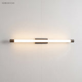 Horizontal LED tube wall light glowing warm across a plain corner wall