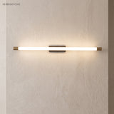 Linear LED wall sconce mounted horizontally on a textured plaster wall