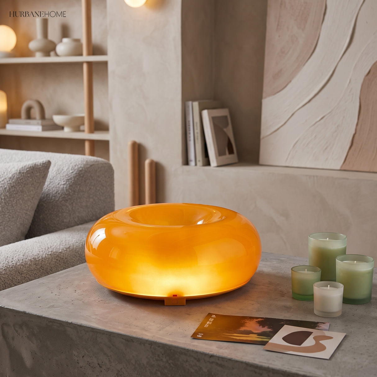 Amber donut glass lamp on a sideboard in a lounge
