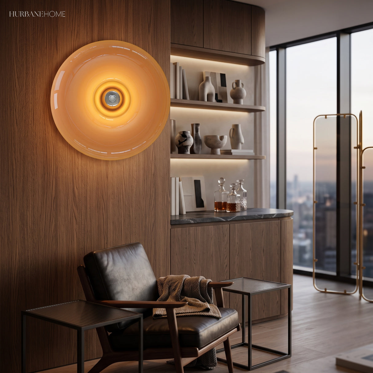 Amber donut glass wall light mounted in a study