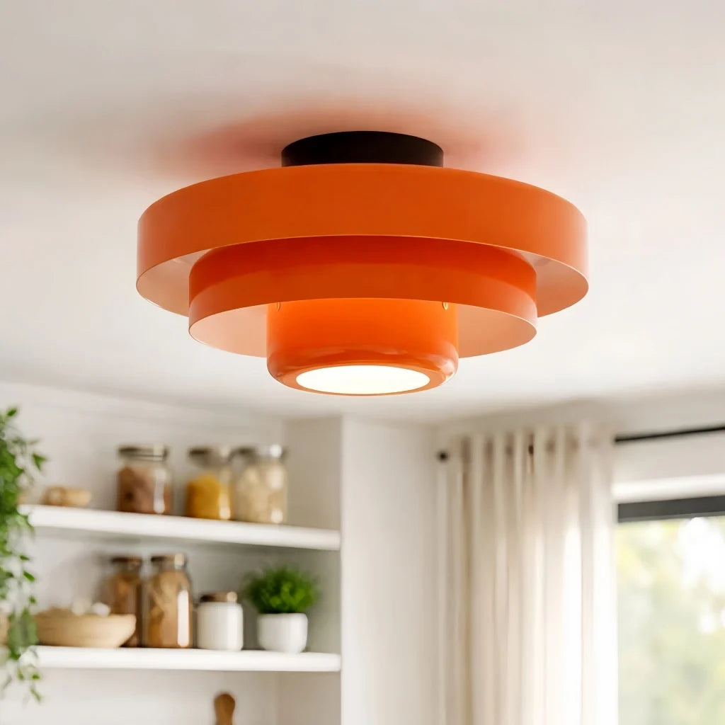 Blue tiered ceiling light shown against a plain white background